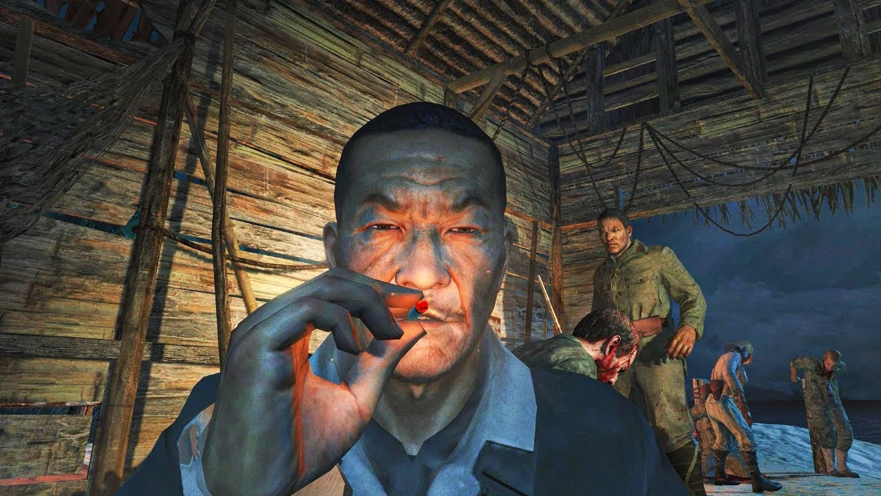A man smoking a cigarette in a wooden hut with soldiers behind him in a Call of Duty game.
