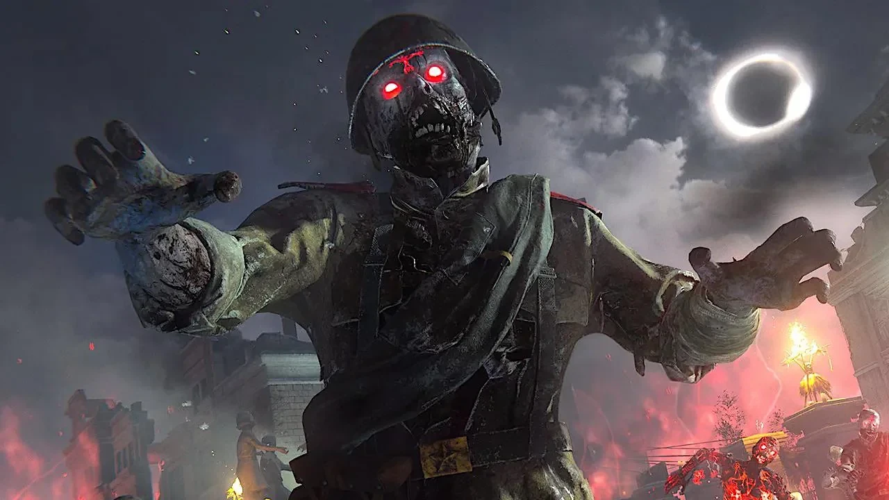 A helmeted World War II zombie with glowing red eyes lunges under an eclipse in a Call of Duty Zombies mode.