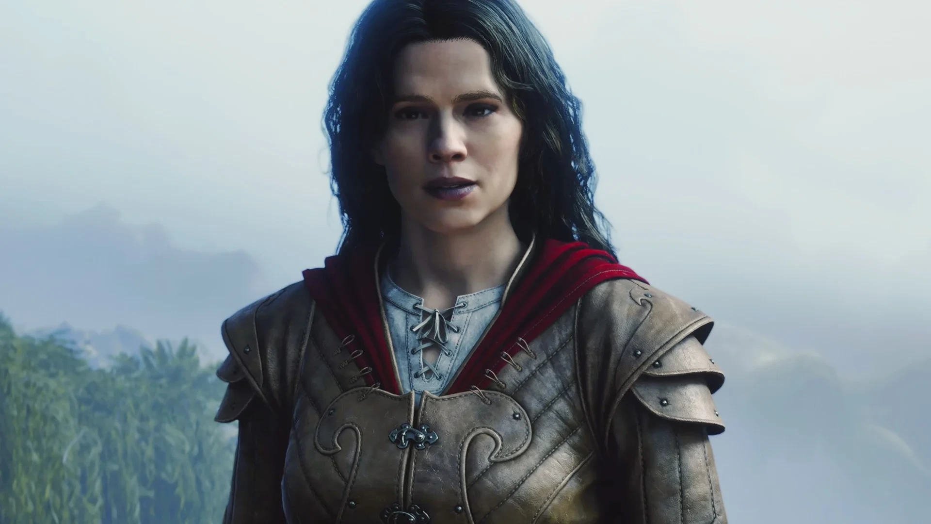 A dark-haired woman in leather armor with a red-lined cloak, the villain in Fable, played by Hayley Atwell.
