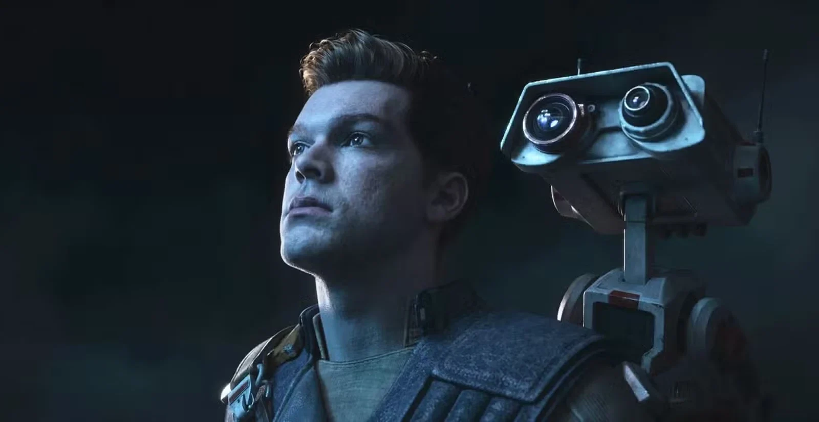 Cal Kestis stands in low light with the droid BD-1 perched on his shoulder.