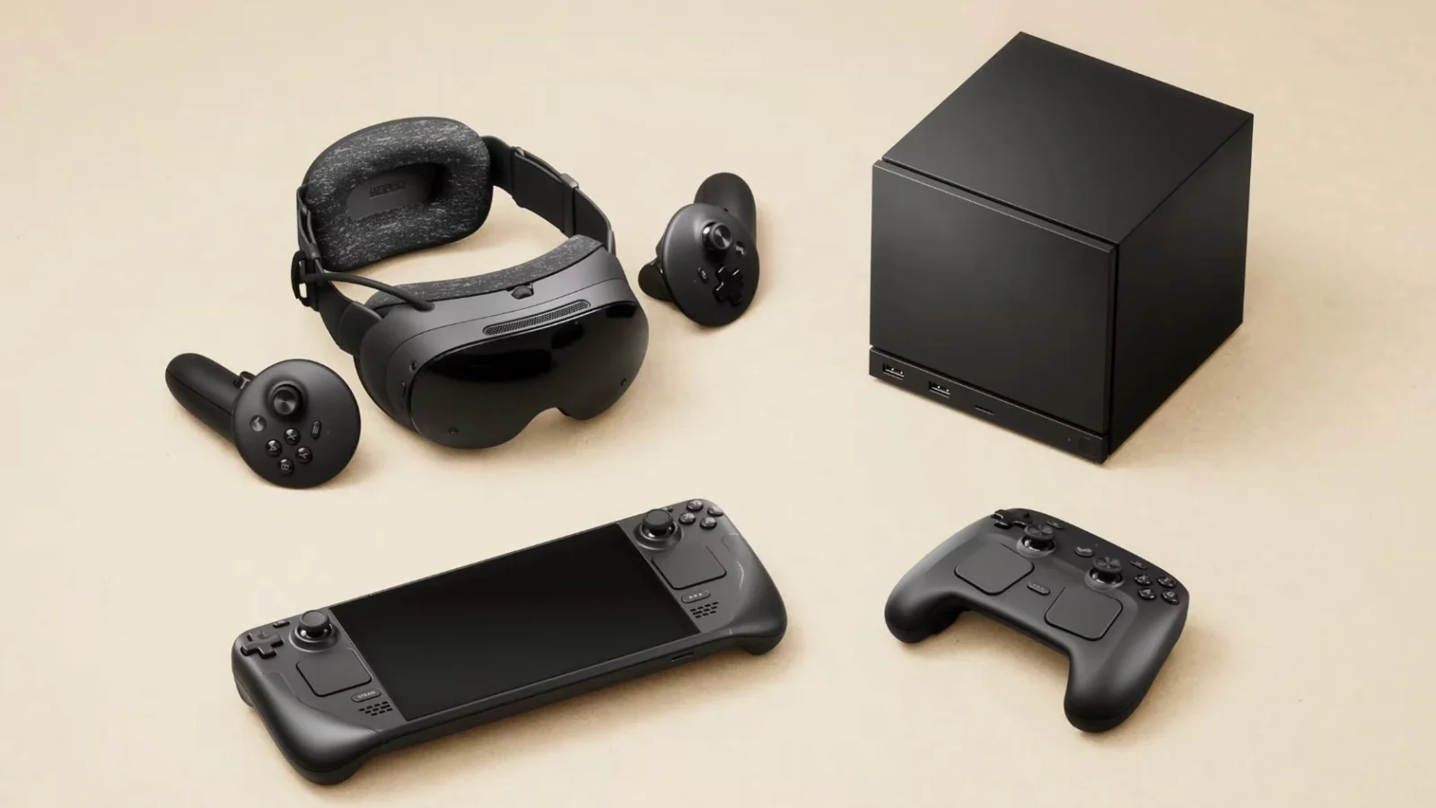 Valve's 2026 SteamOS hardware lineup laid out together: the Steam Frame VR headset and its two controllers, the Steam Deck handheld, the cube-shaped Steam Machine, and the Steam Controller.