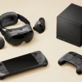 Valve's 2026 SteamOS hardware lineup laid out together: the Steam Frame VR headset and its two controllers, the Steam Deck handheld, the cube-shaped Steam Machine, and the Steam Controller.
