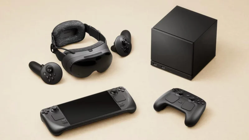Valve's 2026 SteamOS hardware lineup laid out together: the Steam Frame VR headset and its two controllers, the Steam Deck handheld, the cube-shaped Steam Machine, and the Steam Controller.